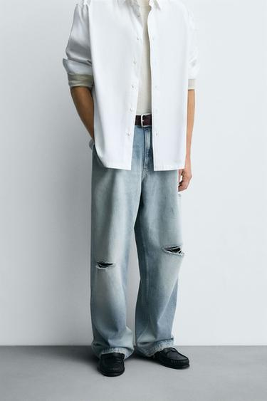 RIPPED BAGGY FIT JEANS - Light blue by Zara
