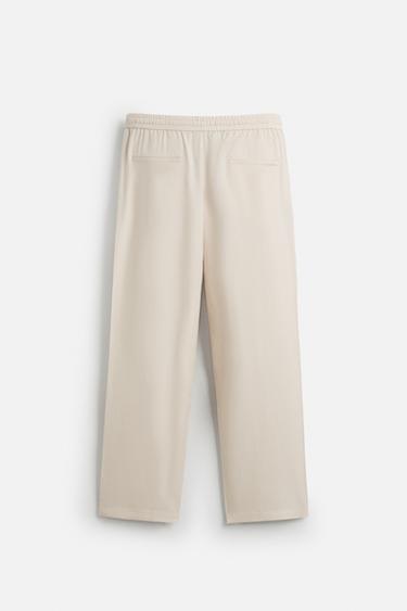 RELAXED FIT LYOCELL TROUSERS - Beige by Zara