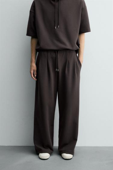 INTERLOCK PLEATED TROUSERS WITH LABEL - Dark brown by Zara