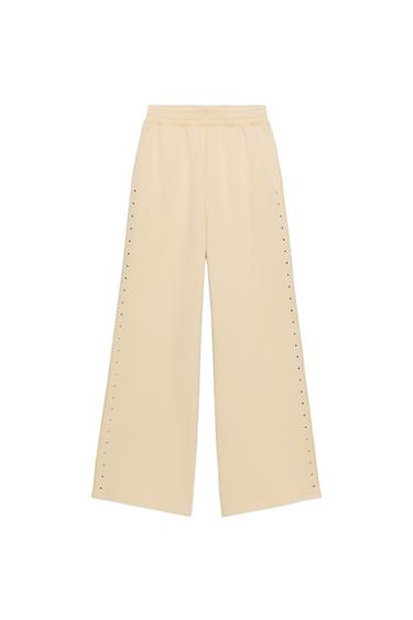 WASHED-EFFECT FLEECE TROUSERS WITH STUDS - Butter by Zara