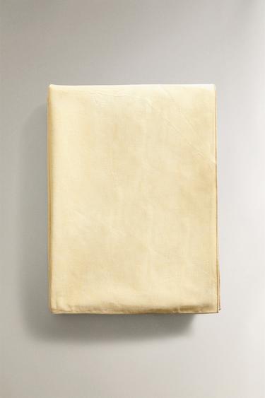 OVERLOCK RESIN-COATED COTTON TABLECLOTH - Yellow by Zara