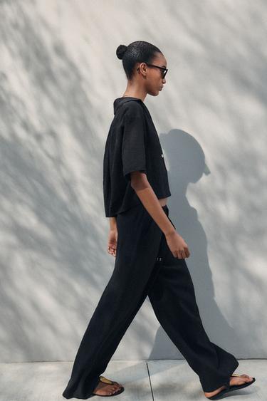 WIDE-LEG TROUSERS WITH ELASTIC WAISTBAND - Black by Zara