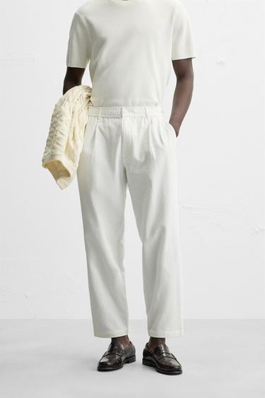 TEXTURED PLEATED TROUSERS - White by Zara