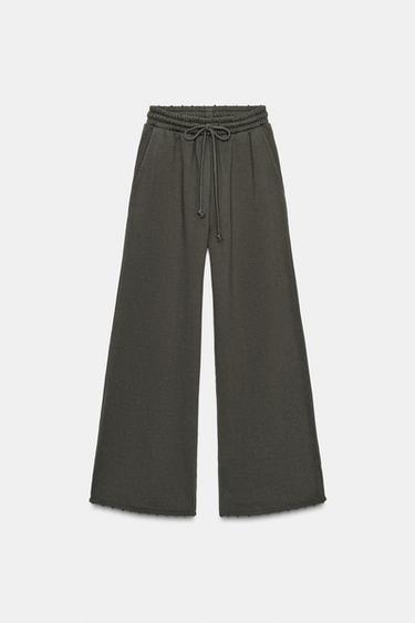 WASHED TROUSERS WITH STAR STUDS - Dark brown by Zara