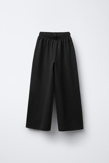 PLAIN INTERLOCK TROUSERS - Black by Zara