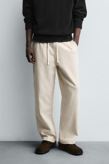 TEXTURED RELAXED FIT TROUSERS - Light beige by Zara