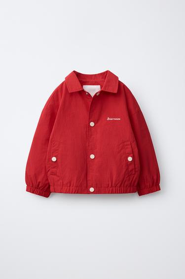 LIGHTWEIGHT WATER-REPELLENT RAINCOAT WITH EMBROIDERED TEXT - Red by Zara