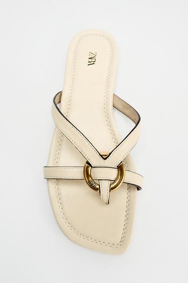 FLAT SANDALS WITH METAL APPLIQUÉ - White by Zara